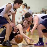 Yakutat&rsquo;s Kim Buller, left, and Nadine Fraker team up against Angoon&rsquo;s Patricia O&rsquo;Brien during the Women&rsquo;s Bracket game in the Lions Club&rsquo;s Gold Medal Basketball Tournament at Juneau-Douglas High School on Tuesday. Yakutat won 61-41. (Michael Penn | Juneau Empire)
