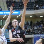 Juneau&rsquo;s Erik Kelly flies to the hoop.(Michael Dinneen | For the Juneau Empire)