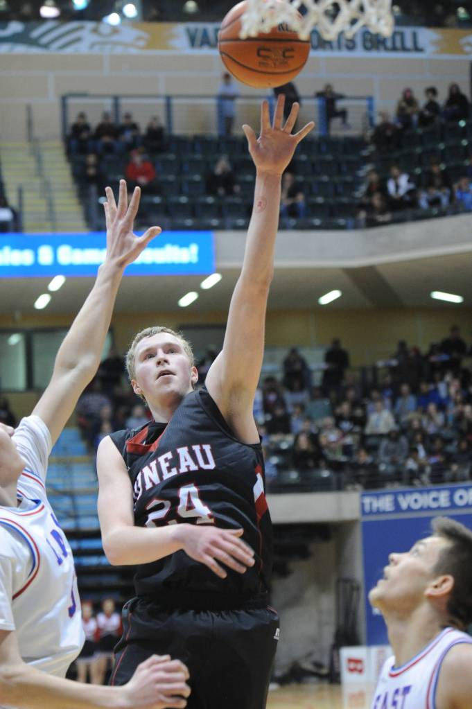 Juneau&rsquo;s Erik Kelly flies to the hoop.(Michael Dinneen | For the Juneau Empire)