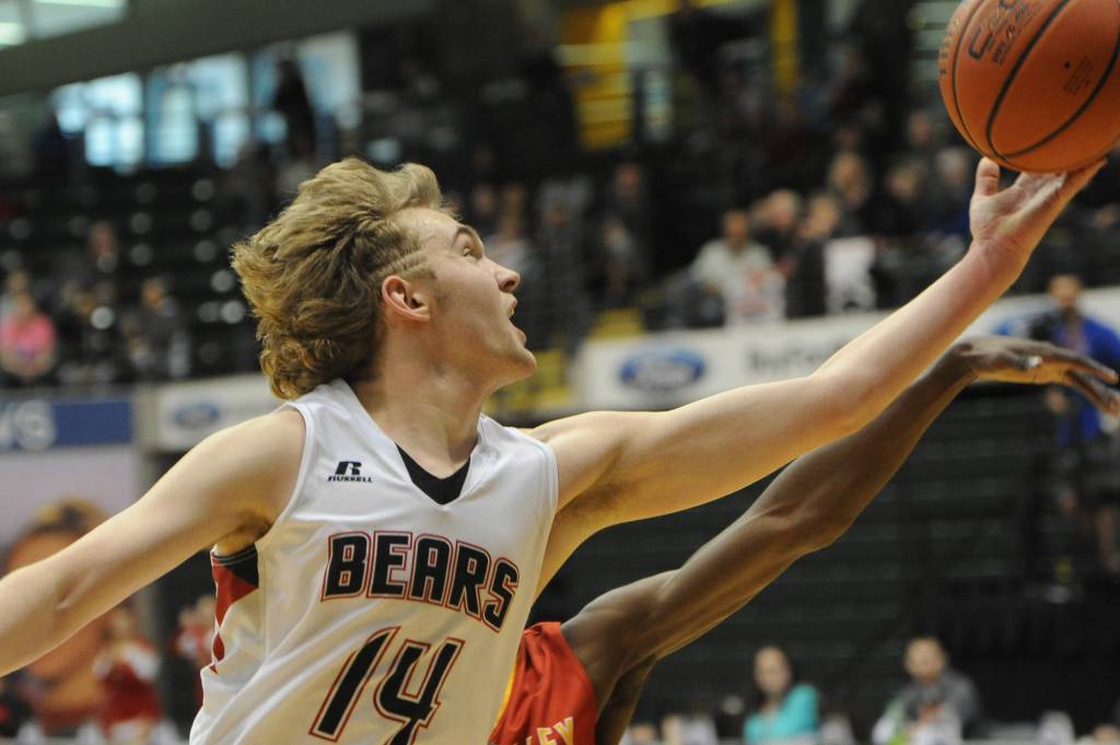 Juneau&rsquo;s Kasey Watts goes to the hoop. (Michael Dinneen | For the Juneau Empire)