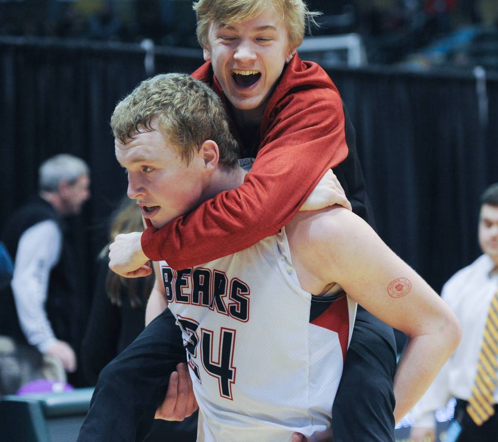 Juneau&rsquo;s Erik Kelly and Tristin Eidsness celebrate their one-point win over West Valley. (Michael Dinneen | For the Juneau Empire)