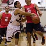 Hoonah&rsquo;s Ken Willard attempts to steal from Kake&rsquo;s Jay Peterson during Gold Medal M Bracket championship game Saturday at Juneau-Douglas High School. Hoonah won 80-78. (Konrad Frank | For the Juneau Empire)