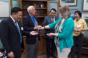Mongolian Parliamentarian Group Leader Saranchimeg Batsukh asks Mayor Ken Koelsch a question during their visit to City Hall on Tuesday, March 28, 2017. The purpose of the visit is to expose officials of emerging democracies to civic processes in the U.S.&nbsp;Juneau’s Rotary clubs hosted the Mongolians during the two-day visit. (Michael Penn | Juneau Empire)