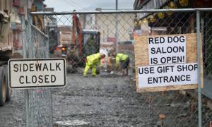 Pedestrian traffic has been closed on both sides of South Franklin Street as construction continues on Thursday. (Michael Penn | Juneau Empire)