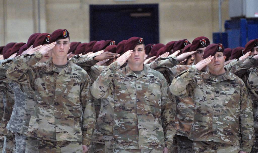 Paratroopers with the Army&rsquo;s 4th Brigade Combat Team (Airborne), 25th Infantry Division salute during a change of command ceremony Friday, March 24, 2017 on Joint Base Elmendorf Richardson. Col. Paul Larson took command from Col. Scott Green, who had led the brigade since 2014. (Star photo by Matt Tunseth)