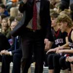 Juneau-Douglas&rsquo; head coach Robert Casperson yells out instructions as his team plays against Dimond High School in the Capital City Classic at JDHS on Friday, Dec. 30, 2016. (Michael Penn | Juneau Empire File)