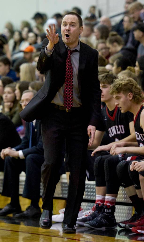 Juneau-Douglas&rsquo; head coach Robert Casperson yells out instructions as his team plays against Dimond High School in the Capital City Classic at JDHS on Friday, Dec. 30, 2016. (Michael Penn | Juneau Empire File)
