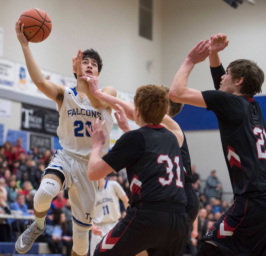 Thunder Mountain&rsquo;s Josh McAndrews shoots against Juneau-Douglas at TMHS on Friday, March 3, 2017. JDHS won 46-40. (Michael Penn | Juneau Empire)