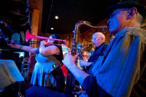 Dancers celebrate to Collette Costa&rsquo;s band during the Alaska Folk Festival weekend at the Red Dog Saloon on Saturday, April 8, 2017. (Michael Penn | Juneau Empire)