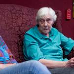 Juneau Pioneer Home resident Phyllis Woodman, right, talks about the grief caused by the Legislature&rsquo;s proposed budget cuts to the home&rsquo;s residents and staff on Tuesday, April 11, 2017. A resident of the home for four years, Woodman was being visited by Carol Schriver, left. (Michael Penn | Juneau Empire)