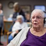 Juneau Pioneer Home resident Betty Daugherty, wearing a hearing device, speaks about the proposed budget cuts by the Legislature on Tuesday, April 11, 2017. (Michael Penn | Juneau Empire)