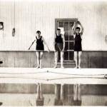 Three men get ready to dive into the pool at the Treadwell Natatorium in this undated photo. (Alaska State Library Historical Collection, ASL-P525-6-21)