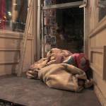 Blankets are piled in the doorway of Ad Lib on South Franklin Street on Saturday night. The doorway, just next to the Glory Hole, was unoccupied on the first night of the city&rsquo;s anti-camping ordinance being in effect.