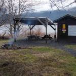 Thane Campground sat empty, save for a small fire, on its first day of operation Saturday. The city is hoping that the campground serves as a spot for homeless to stay. Alex McCarthy | Juneau Empire