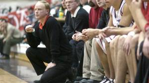 Juneau-Douglas High School head basketball coach George Houston watches his team play Colony in Feb. 2002 at JDHS. (Michael Penn | Juneau Empire File)