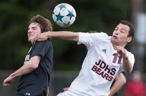 Juneau-Douglas&rsquo; Ben Carter, right, competes against South&rsquo;s Luke Gale at Adair-Kennedy Memorial Field on Thursday, April 20, 2017. (Michael Penn | Juneau Empire)