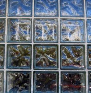 Reflection of the Governor&rsquo;s Mansion in glass bricks. Photo by Brooke Daly.