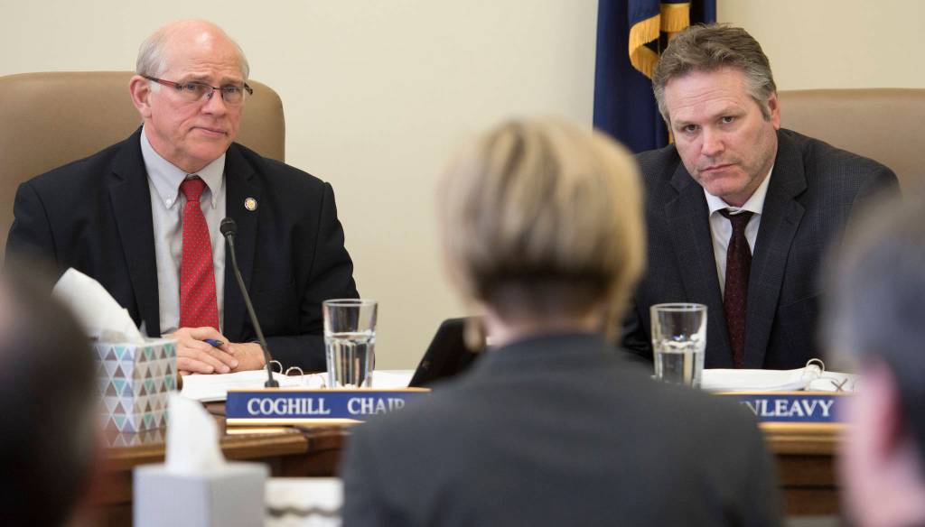 Senate Judiciary Committee Chair John Coghill, R-North Pole, left, and Sen. Mike Dunleavy, R-Wasilla, listen to Alaska Attorney General nominee Jahna Lindemuth answers questions at the Capitol on Wednesday, April 12, 2017. A vote by a joint session of the legislature on Gov. Bill Walkers appointments has been delayed this week. (Michael Penn | Juneau Empire)