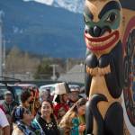 Haines residents and veterans watch as the Dei Shu Dancers of Haines and the Klukwan Chilkat Dancers celebrate the unveiling of a Tlingit screen and totem poles in front of the Soboleff McRae Wellness Center in Haines on Thursday, April 27, 2017. The Center, which has been open for about a year, has 11 apartments for military veterans along with nonprofit organizations. Haines Tlingit master carver Wayne Price produced the two 12-foot totems in honor of Tlingit veterans Walter Soboleff (Raven/Dog Salmon) and Howard McRae (Eagle/Wolf). The screen/sign is called Warriors Spirit. Price said, &ldquo;When art is dedicated in this manner, presented with witnesses and dance, that is what makes it real, what gives it life. Now the art has life and people will feel it.&rdquo; (Michael Penn | Juneau Empire)