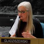 Assembly member Maria Gladziszewski refers to issues of the Empire from 1989, illustrating the long process of amending the city&rsquo;s mining ordinance. The mining ordinance is back under discussion after a proposal written by five businessmen. (Alex McCarthy | Juneau Empire)