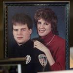 A picture on display of Juneau Police Officer Karl William Reishus and his wife, Sue, at a remembrance ceremony at the Father Andrew P. Kashevaroff Building on Thursday, May 4, 2017, on the 25th anniversary of his death. (Michael Penn | Juneau Empire)