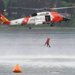 A rescue crew from Station Sitka demonstrate their skills in the harbor during the Juneau Maritime Festival at Marine Park in Juneau on Saturday, May 7, 2016. (Michael Penn | Juneau Empire File)