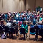 Kirk Duncan, director of the city&rsquo;s Parks and Recreation Department, speaks in front of nearly two hundred people who attended a meeting at Centennial Hall on Tuesday, May 2, 2017, about the rebuilding of Project Playground at Twin Lakes. (Michael Penn | Juneau Empire)