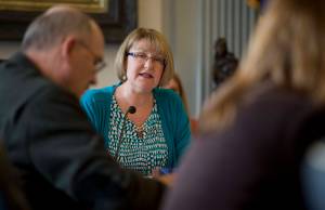 Sen. Anna MacKinnon, R-Eagle River, co-chair of the Senate Finance Committee, works on final amendments to a bill at the Capitol on Tuesday, May 9, 2017. (Michael Penn | Juneau Empire)