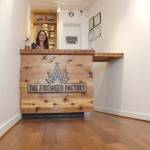 Fireweed Factory Store Manager Emma Harper awaits customers at its shop on Front Street. The marijuana retailer quietly opened Tuesday and business has already been good. (Alex McCarthy | Juneau Empire)