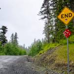 A sign sits at the end of the Juneau road in June 2014. (Marlena Sloss | Juneau Empire File)