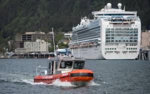 PHOTOS BY Michael Penn | Juneau Empire U.S. Coast Guard personnel aboard a 25-foot Response Boat conduct a Maritime Security Response operation in the Juneau harbor on Wednesday.