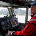 Boatswain Jesse Wilde drives the U.S. Coast Guard&rsquo;s 45-foot response boat in Juneau&rsquo;s harbor on Wednesday, May 17, 2017. (Michael Penn | Juneau Empire)