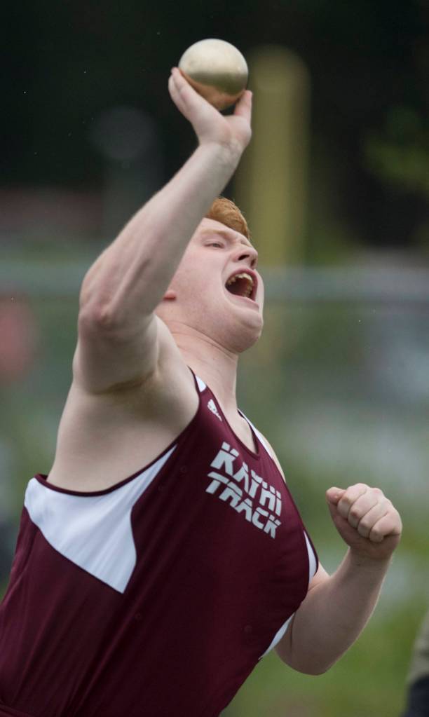 Joey Rhodes competes in the shot put at the Region V Track and Field meet at Thunder Mountain High School on Friday, May 19, 2017. (Michael Penn | Juneau Empire)