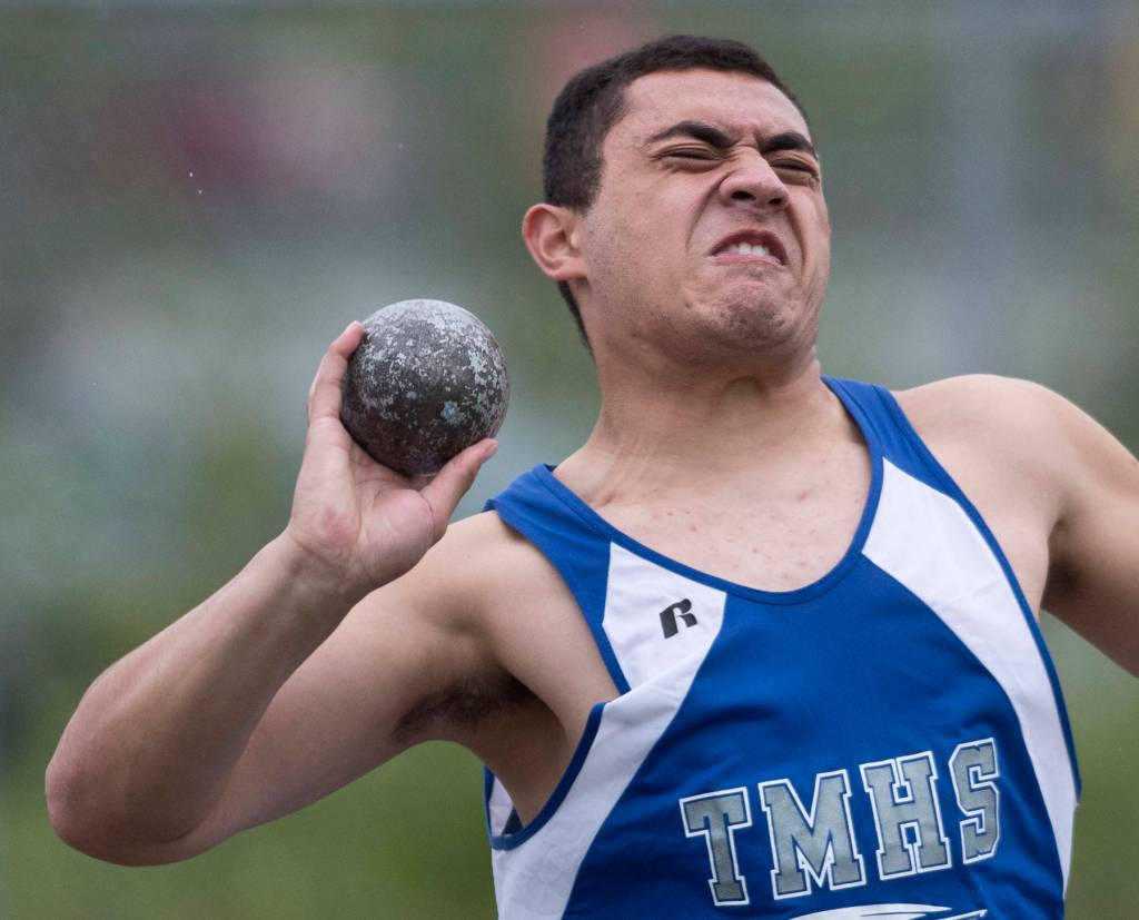 Thunder Mountain&rsquo;s Garth Tupou win the shot put event with a throw of 44 feet 10.25 inches at the Region V Track and Field meet at Thunder Mountain High School on Friday, May 19, 2017. (Michael Penn | Juneau Empire)