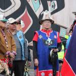Honored speakers in front of the Huna Tribal House in Bartlett Cove. (Mary Beth Moss | For the Capital City Weekly)