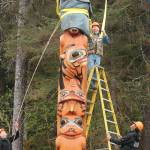 The Eagle Pole is bolted in place in front of the Huna Tribal House. (Mary Beth Moss | For the Capital City Weekly)