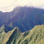 Mountainous peak in clouds (Thinkstock)