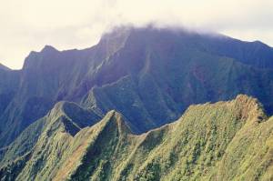Mountainous peak in clouds (Thinkstock)