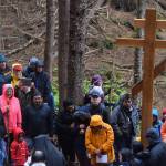Survivors, friends and family visit the Funter Bay internment camp where of hundreds of Aleutian and Pribiloff Island Alaska Natives were held during WWII. Commemorating the 75th anniversary of the internment, the group installed a &ldquo;healing cross&rdquo; at the grave site of those who perished during their years of internment. (Kevin Gullufsen | Juneau Empire)