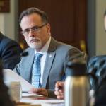 Sen. Donald Olson, D-Golovin, right, Sen. Peter Micciche, R-Soldotna, center, and Sen. Lyman Hoffman, D-Bethel, of the Senate Finance Committee listen to Dr. Jay C. Butler, Chief Medical Officer for the Alaska Department of Health and Social Services, and Sara Chambers, Deputy Director of the Division of Corporations, Business and Professional Licensing at the Department of Commerce, Community and Economic Development, speak about an opioids bill at the Capitol on Tuesday, May 30, 2017. (Michael Penn | Juneau Empire)