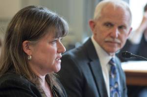 Sara Chambers, Deputy Director of the Division of Corporations, Business and Professional Licensing at the Department of Commerce, Community and Economic Development, left, and Dr. Jay C. Butler, Chief Medical Officer for the Alaska Department of Health and Social Services, speak about an opioids bill in front of the Senate Finance Committee at the Capitol on Tuesday, May 30, 2017. (Michael Penn | Juneau Empire)