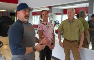 Michale Joern, left, Therese Jones and Steve Lewis talks about their new ownership of The Gym on Friday, June 2, 2017. (Michael Penn | Juneau Empire)