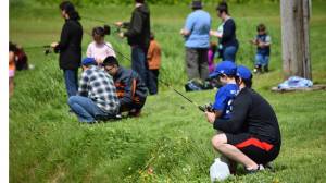 Young anglers learn how to sport fish at Family Fishing Day at Twin Lakes on June 3, 2017. (Kevin Gullufsen | Juneau Empire)