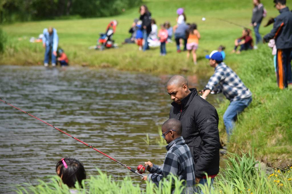 Young anglers learn how to sport fish at Family Fishing Day at Twin Lakes on June 3, 2017. (Kevin Gullufsen | Juneau Empire)