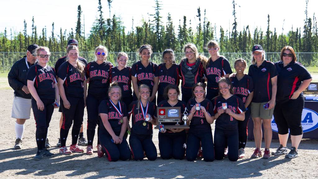 The Juneau-Douglas High School softball team poses with the state small schools softball runner-up trophy, Saturday, June 3, in Fairbanks. JDHS lost to Thunder Mountain High School 17-6 in the championship game. Top row: Mia Loree, Ariana Connally, Sophia Schauwecker, Amanda VanSlyke, Leah Spargo, Alyxn Bohulano, Skylar Hickok, Caitlin Pusich, Asianna Mazon, Coach Annie Kincheloe, Coach Lexie Razor. Bottom row: Morgan Balovich, Sami Good, Maddie Johnson, Ally Ireland-Haight, Elisa Fabrello. (Sarah Manriquez | For the Juneau Empire)