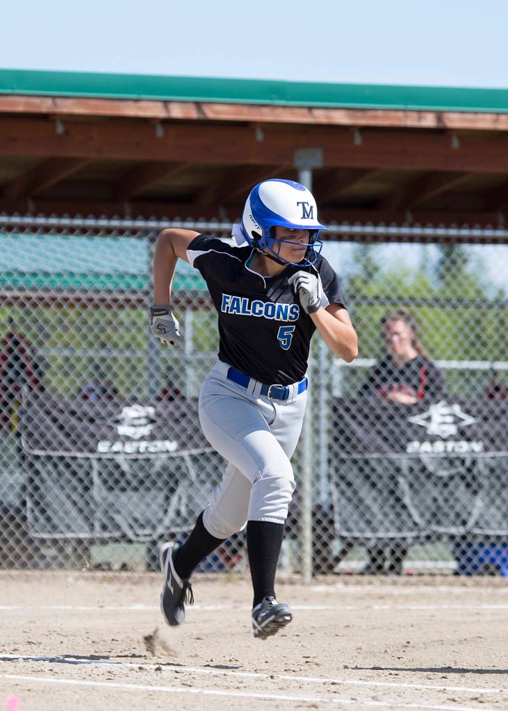 Thunder Mountain High School&rsquo;s Maxie Saceda-Hurt runs to first base after making a hit against Juneau-Douglas High School in the ASAA Small Schools State Championship game, Saturday, June 3, in Fairbanks. (Sarah Manriquez | For the Juneau Empire)