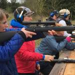 Shari Paul and others at the shooting range. Photo by Linda Newman