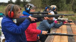 Shari Paul and others at the shooting range. Photo by Linda Newman