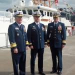 (From left to right) Vice Admiral Fred Midgette, commander of the Coast Guard pacific area, Lieutenant Frank Reed, commanding officer of the USCGC Bailey Barco, and Rear Admiral Michael McAllister, commander of the 17th coast guard district, stand in front of the newly commissioned coast guard cutter, Bailey Barco, following the commissioning ceremony Wednesday afternoon. (Erin Granger | Juneau Empire)