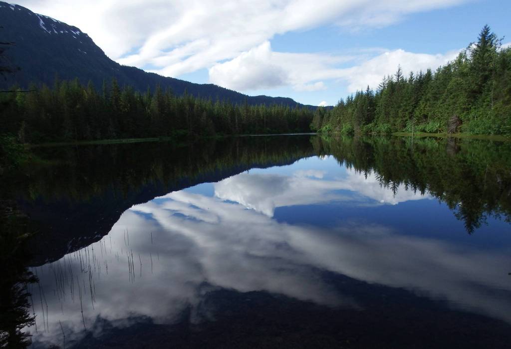 Cloud reflections in Dredge Lakes, early June. (Photo by Linda Shaw)